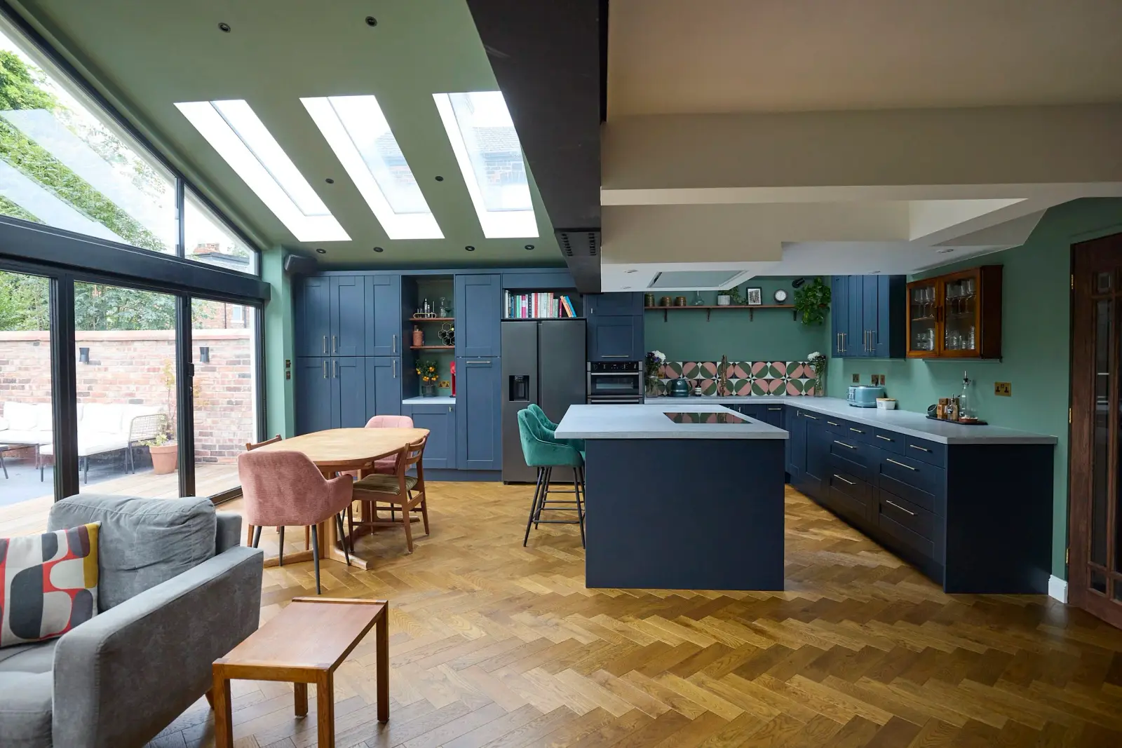 Open plan Chorlton kitchen dining and living space with herringbone parquet floor
