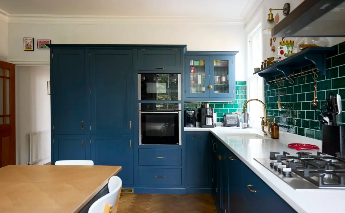 DeVol shaker kitchen in Bond Street Blue with rustic oak herringbone floors