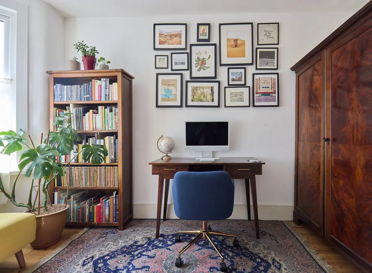 Restored hallway with painted banisters and original floorboards